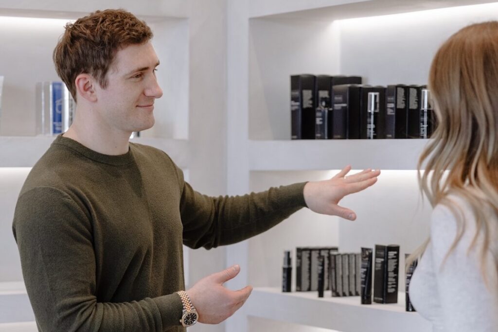 A provider at Honey Aesthetics helps a patient find eye products for dark circles in Minneapolis.